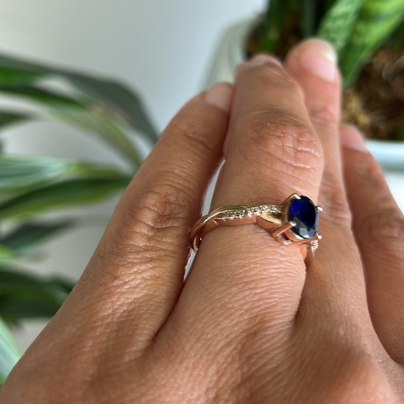 Oval Blue Sapphire and Diamond Birthstone Twist Ring in 10KT Rose Gold - Picture 7 of 7